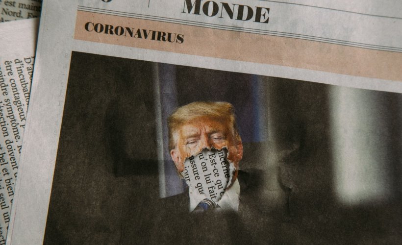 cutout from french newspaper showing donald trump