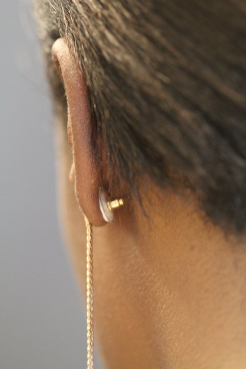 earring seen from the back of a woman's ear