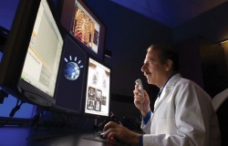 Eliot Siegel, seen with IBM’s cognitive computer Watson at the University of...