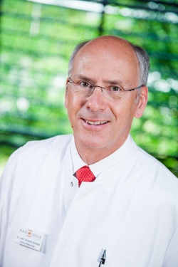 Dr. Roland Scheck