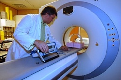 A physicist measuring the CT radiation output. (Photo: D. Calma/IAEA)