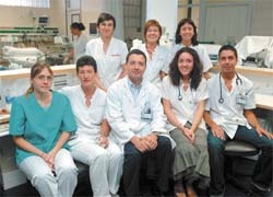 Dr José MarÌa Nicolás (centre) with the hospitals ICU team. Dr Nicolás is...