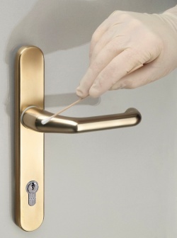 Sample being taken from a cleanic copper door handle made by the German firm...