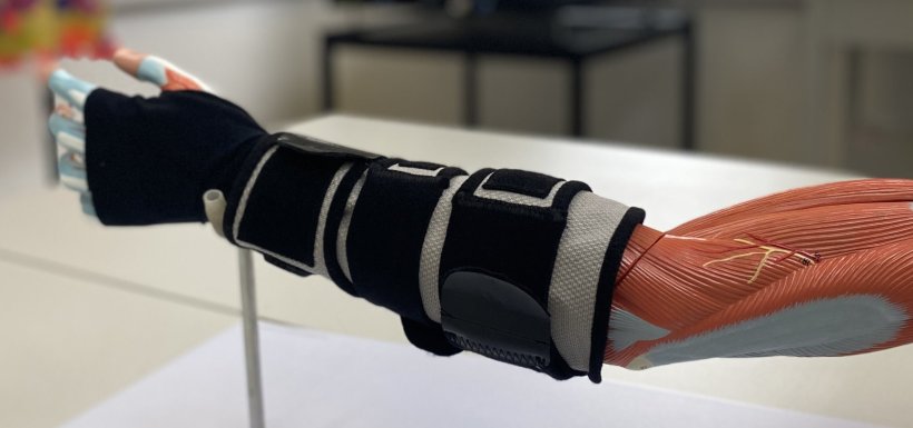 The stroke glove prototype on a lab model