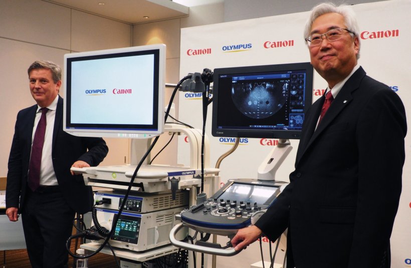 Frank Drewalowski, Head of the Endoscopic Solutions Division at Olympus (left),...