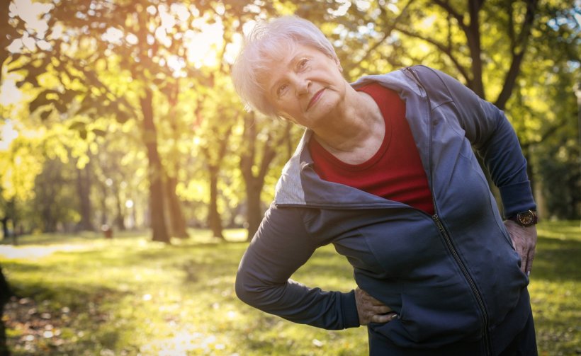 active senior woman exercising outdoors