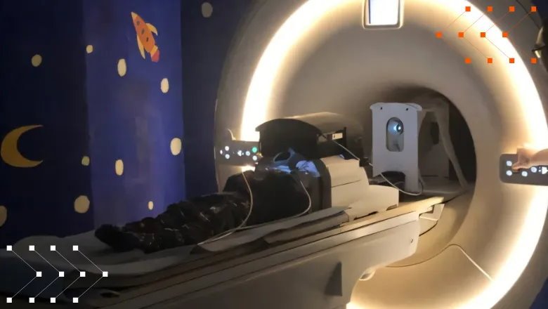 Child lying in MRI scanner