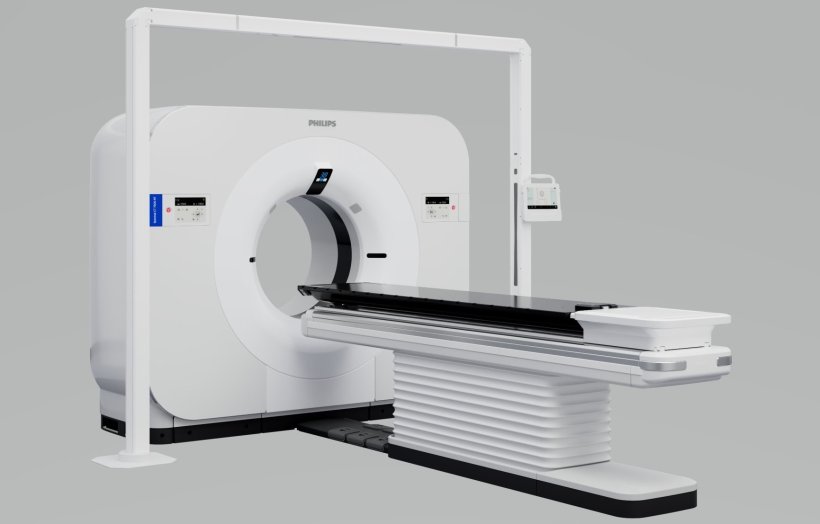 A Spectral CT scanner on a plain grey background