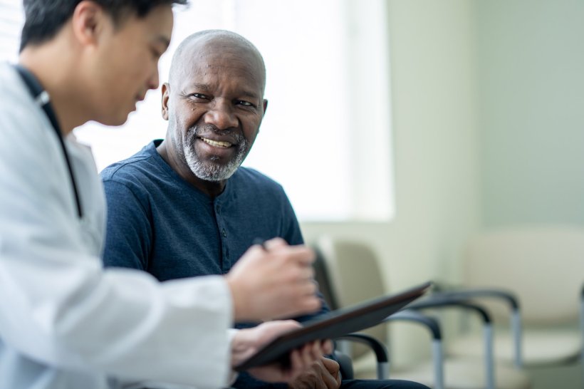 A doctor is consulting with his patient