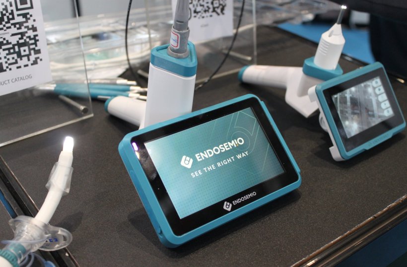 A range of portable endoscopy devices on display at a medical technology expo