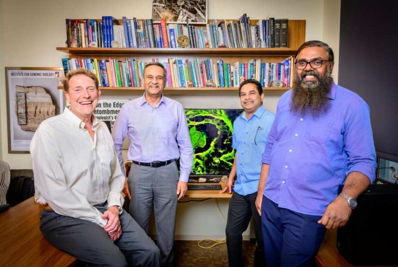 Four men, Bruce Fouke, Rohit Bhargava, Mayandi Sivaguru and Ashok Samuel,...