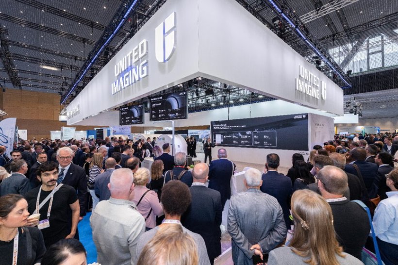 A crowded booth of diagnostic imaging company United Imaging at a medical...