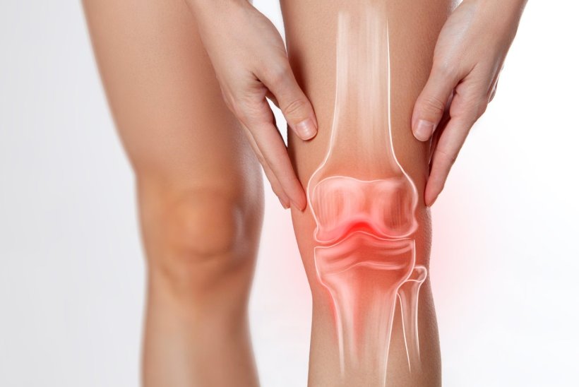 Closeup photo on a persons legs, with the knee bones overlaid