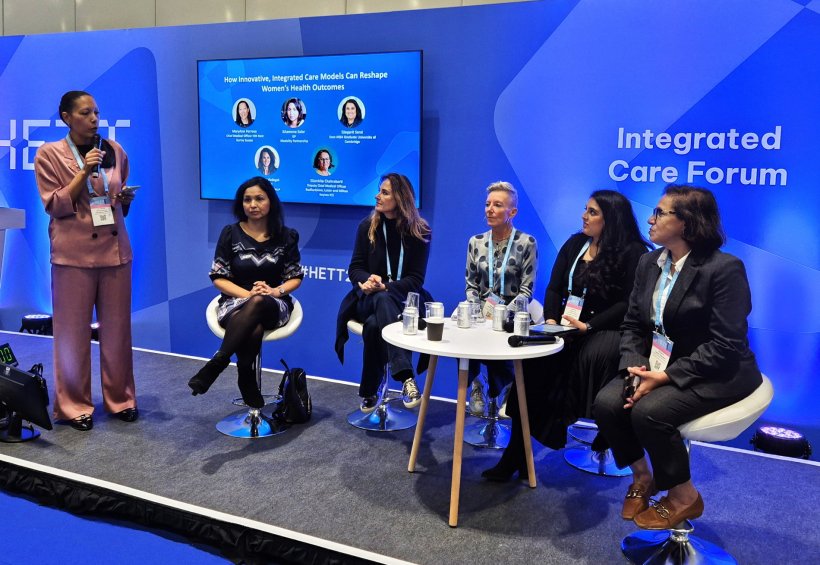 A panel consisting of five women at a health IT conference, with their session...
