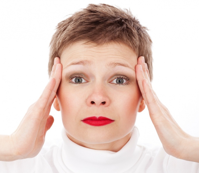 woman having a headache, migraine