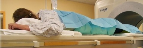 woman lying in a hifu medical ultrasound device