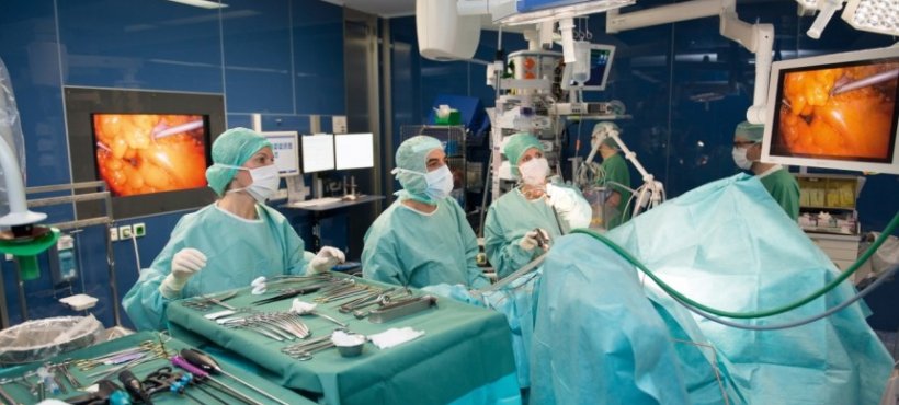 team of surgeons performing endoscopy intervention