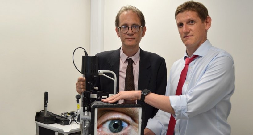 Dr Mario Giardini & Dr Iain Livingstone with a slit lamp used in virtual...