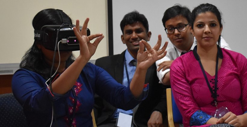Students on Professor Peebles 2017 visit to India get to grips with a VR headset