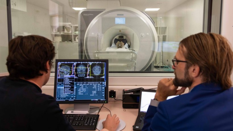 Dr Philip Koch and Professor Friedhelm Hummel performing an MRI