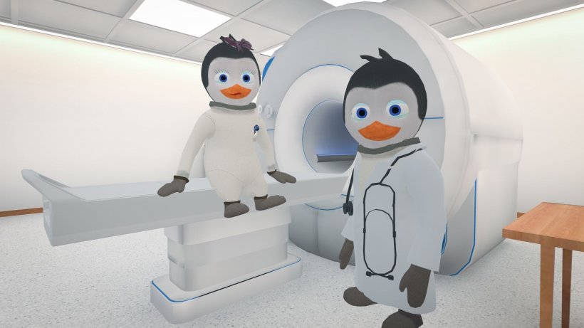 Pengunauts Lotta and Lars help kids practice laying still during an MRI exam