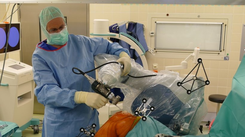 In orthopaedic surgery, however, we require a system that can precisely perform...