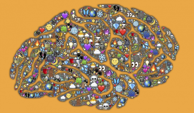 stock image of the brain composed of emoticons and emoji