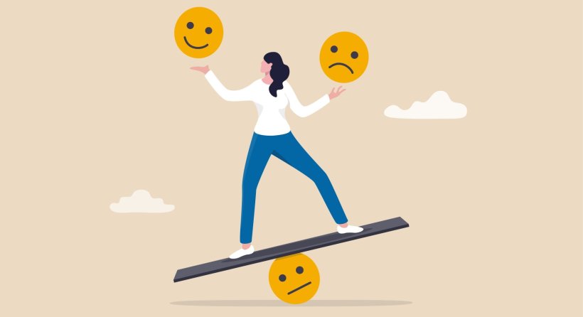 illustration of woman balancing positive and negative emotions