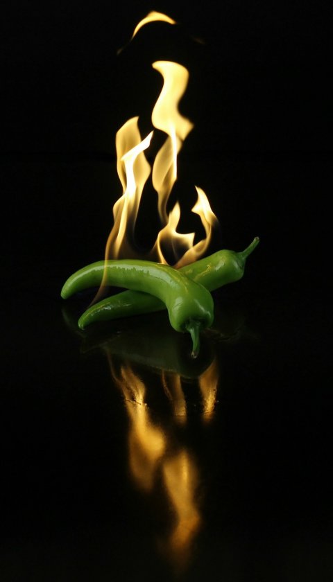 burning green chili peppers