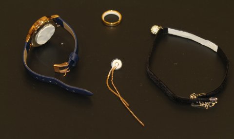 assortment of jewelry, wristwatch, earring, necklace, ring and choker