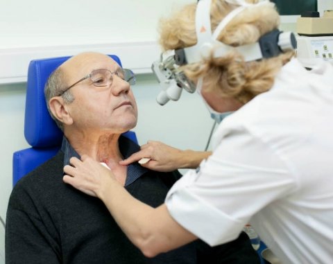 female doctor treating patient