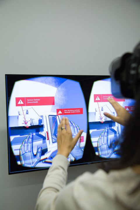 person with VR headset moving in virtual environment