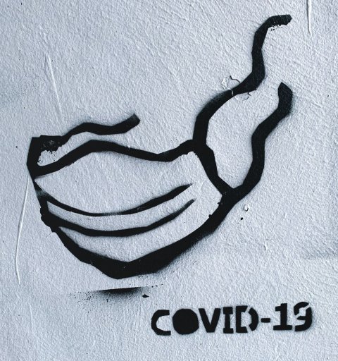 graffiti of face mask and covid-19 text