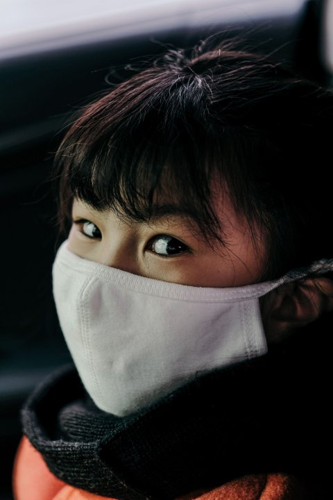 asian girl wearing white face mask