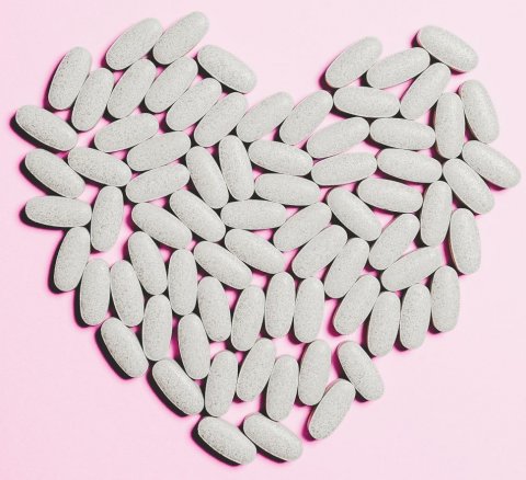 pills arranged in heart shape