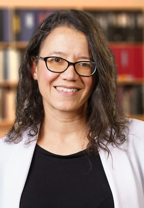 Portrait photo of Camila dos Santos, PhD