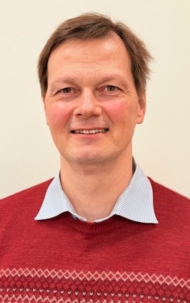 Portraitfoto von Dr. Christian Stredicke