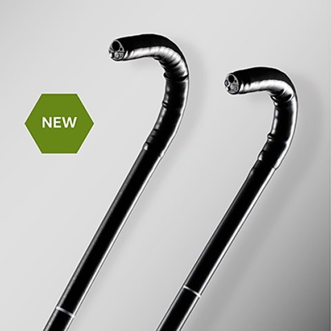 Two curved endoscope tips, next to a hexagonal button labelled 'NEW'