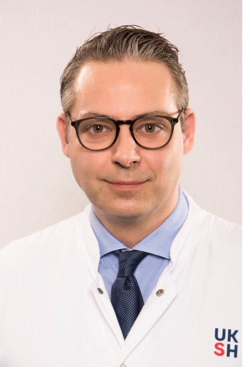 Portraitfoto von Dr. Rene Rusch